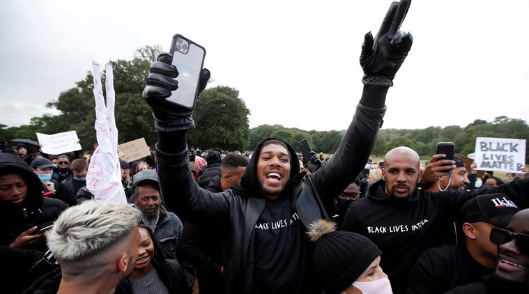 World boxing champion Anthony Joshua attends march, says racism is a pandemic
