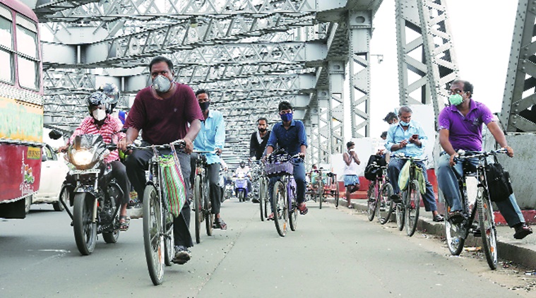 covid-19 in kolkata, covid-19 lockdown in kolkata, kolkata cycling popularity, kolkata cycle pedalling to work, indian express news