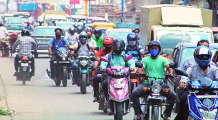 Bengal: Eatries allowed too Curbs extended, but malls can reopen