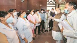 Amit Shah visits LNJP, says recovered should get good-health certificates