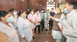 Amit Shah visits LNJP, says recovered should get good-health certificates