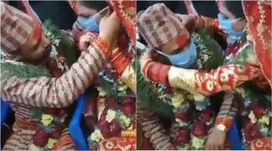 Bride, groom make each other wear masks at wedding, video goes viral |  Trending News,The Indian Express
