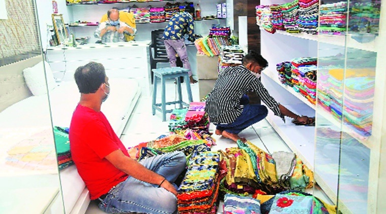 coronavirus, coronavirus in gujarat, covid 19 in surat, surat textile traders association, surat textile quarantine relaxtaion, vijay rupani, indian express news