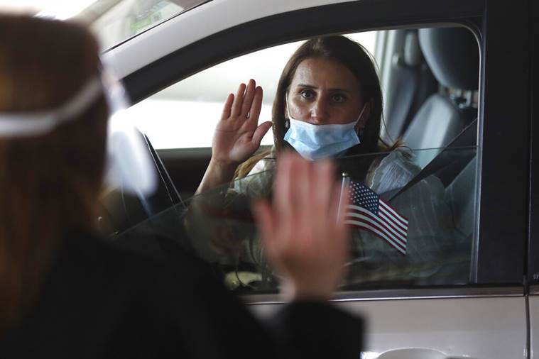 Drive-up US citizenship eases backlog, but new threat looms