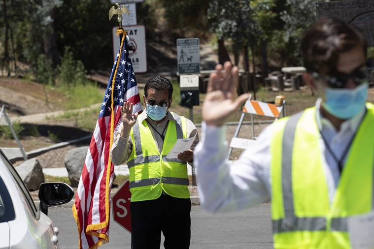 Drive-up US citizenship eases backlog, but new threat looms