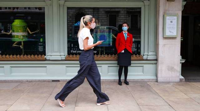 UK slashes official virus death toll by more than 5,000