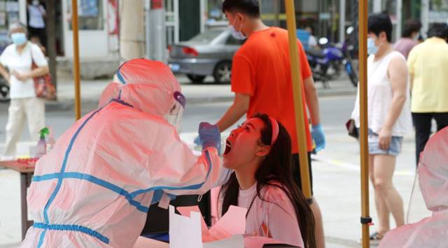 Mainland China, Hong Kong report fewer new cases