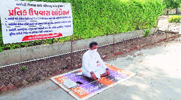 Paresh Dhanani, covid testing laboratory, hunger strike, Rajkot news, Indian express news