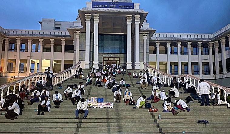 Karnataka doctors strike, Coronavirus Karnataka doctor strikes, Covid-19 Karnataka, AAYUSH doctors strike, indian express