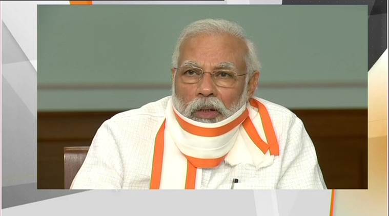 PM Narendra Modi, bjp workers, modi addresses bjp workers, coronavirus crisis, bjp workers service, indian express