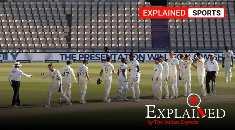 West Indies batsmen, center, greet England players after winning the first cricket Test match between England and West Indies, at the Ageas Bowl in Southampton, England, Sunday, July 12, 2020. (Adrian Dennis/Pool via AP)