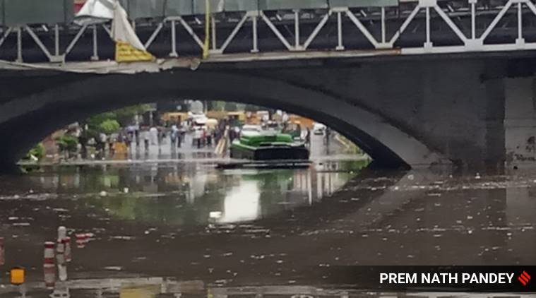 delhi rains, delhi floods, delhi water logging, delhi minto bridge flooding, delhi man drowns minto bridge, delhi city news