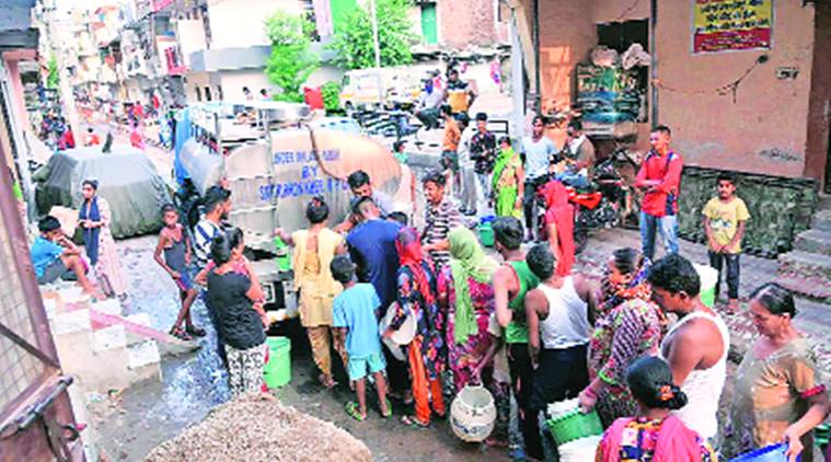Chandigarh: Social distancing goes for a toss as people get water from tankers in Mauli complex - The Indian Express