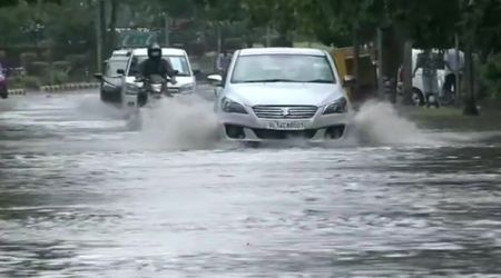 Water logging in several parts of Delhi after the heavy rainfall Sunday morning. (ANI/Twitter)