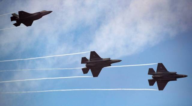 South Korean Air Force F-35 Lightning II fighter jets, manufactured by Lockheed Martin Corp., perform maneuvers during media day at the Seoul International Aerospace & Defense Exhibition (ADEX) at Seoul Air Base in Seongnam, South Korea, on Monday, Oct. 14, 2019. The exhibition opens on Oct. 15 and will run through Oct. 20. (Photographer: SeongJoon Cho/Bloomberg)