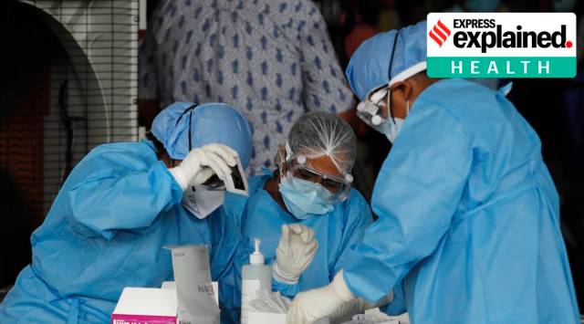 Health workers conduct tests for migrant workers in New Delhi (AP)