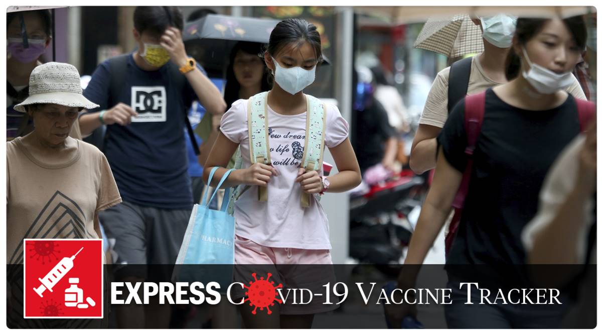 People wearing face masks to protect against the spread of the coronavirus walk in Taipei, Taiwan(AP Photo)