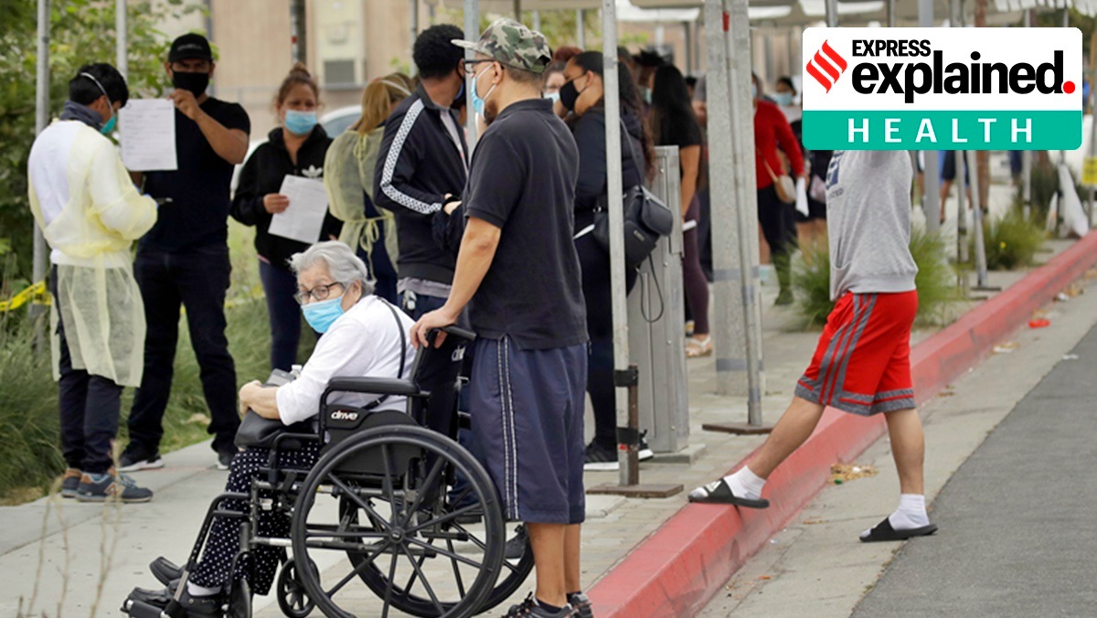 People line up at a mobile coronavirus testing site at the Charles Drew University of Medicine and Science Wednesday, July 22, 2020, in Los Angeles. (AP Photo)