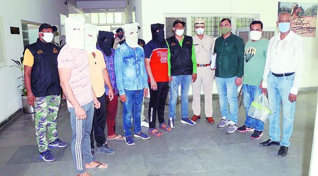 The sharpshooter and his four accomplices were arrested in connection with the murder of a Faridabad resident.