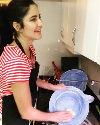 Katrina washing the utensils