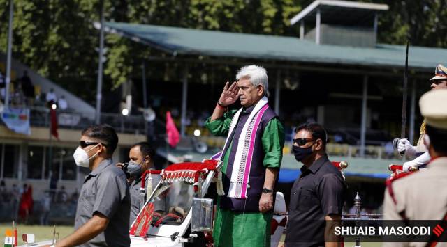 J&K's newly-appointed L-G Manoj Sinha said the government is committed to providing a better alternative that stands for development, welfare and social transformation for the people of Jammu and Kashmir. In pic:  Manoj Sinha takes salute after hoisting the national flag during the 74th Independence Day celebrations at Sher-i-Kashmir Cricket Stadium in Srinagar. (Express photo by Shuaib Masoodi)