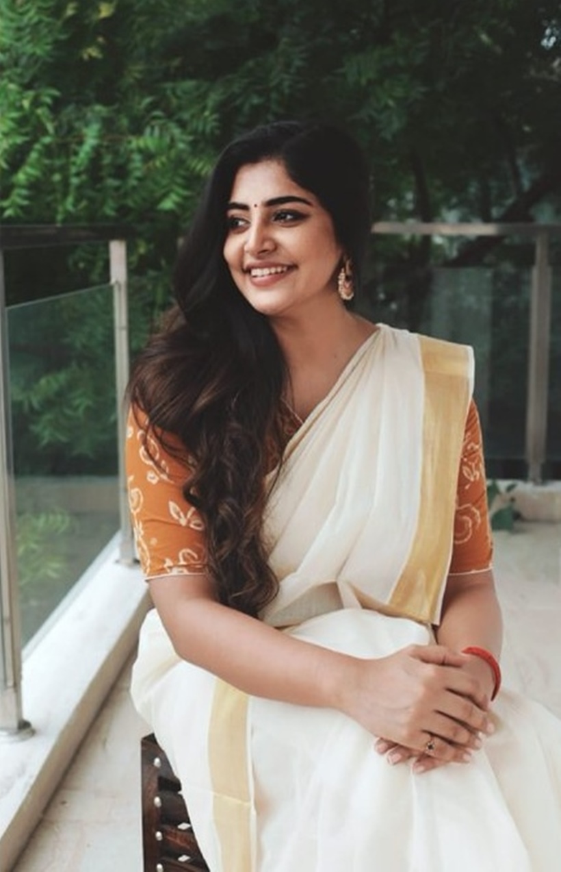 Manjima Mohan in a mint mogra dress for Kalathil Sandhippom promotions