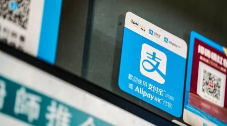 A sign for digital payment service Ant Financial's Alipay, an affiliate of Alibaba Group Holding Ltd., is displayed at a store in Hong Kong, China, on Tuesday, July 21, 2020. (Photographer: Lam Yik/Bloomberg)