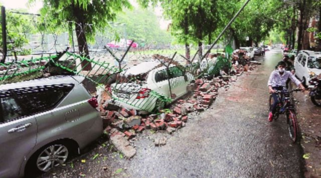 At Saket J Block, Wednesday. Seven cars were damaged in the wall collapse. Tashi Tobgyal