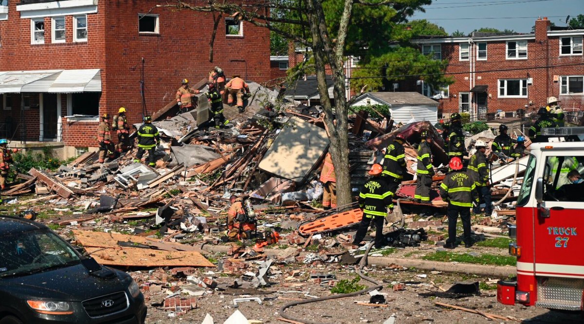 Firefighters at the scene of where homes are destroyed  Monday, August 10, 2020 at Boxhill Road and Reisterstown Road in Northeast Baltimore. (Jerry Jackson/The Baltimore Sun via AP)