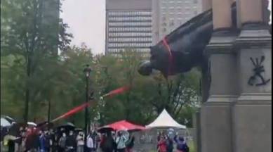Canada statue toppled, Sir John A MacDonald, former Canadian PM statue toppled, black lives matter, Canada BLM protests, montreal, indian express