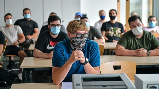 europe schools open amid covid-19, europe school photos, europe news, coronavirus outbreak, coronavirus latest news, covid vaccine, social distancing in schools, world news, indian express