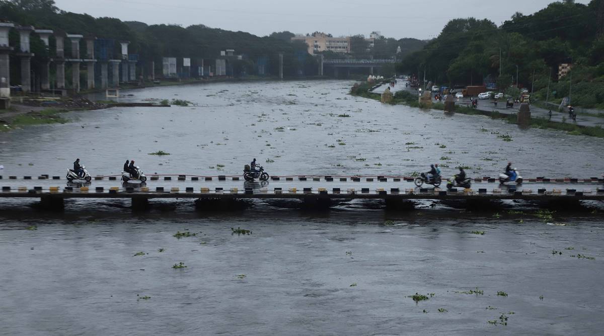 Pune rains, Pune weather news, Pune weather, Pune rains latest news, Mutha river overflow, bhide bridge, pune news, indian express