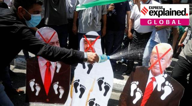 Palestinians burn cutouts depicting US President Donald Trump, Abu Dhabi Crown Prince Mohammed bin Zayed al-Nahyan and Israeli Prime Minister Benjamin Netanyahu during a protest in Nablus in the Israeli-occupied West Bank. Reuters/Raneen Sawafta