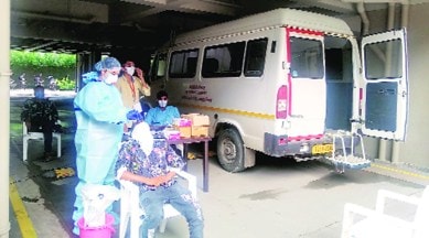 ahmedabad coronavirus latest updates, ahmedabad covid-19 testing, ahmedabad covid testing, ahmedabad Dhanvantri Rath covid testing, ahmedabad city news