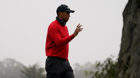 Tiger Woods waves on the 11th hole during the final round of the PGA Championship golf tournament at TPC Harding Park Sunday, Aug. 9, 2020, in San Francisco. (AP Photo/Jeff Chiu)