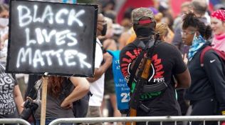 Thousands peacefully protest outside the Kentucky Derby