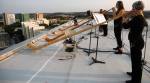 Musicians Germany perform concert apartment roofs, Dresden, music concert, alphorns, Dresdner Sinfoniker orchestras, trending, indian express, indian express news