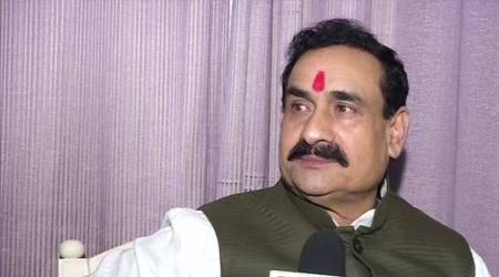 MP minister mask, Narottam Mishra, Madhya Pradesh Home Minister Narottam Mishra, MP congress, BJP leader denies to wear mask, MP coronavirus cases, Indian express