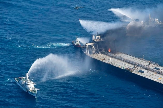 sri lanka tanker fire, indian oil tanker fire photos, Oil tanker fire pics, tanker fire, Tanker fire rescue operations, indian express