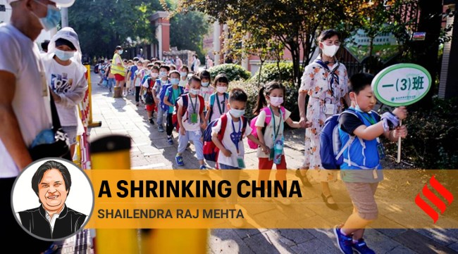 Students wearing protective face masks walk out of a primary school, following the coronavirus disease (COVID-19) outbreak in Wuhan, Hubei province, China September 2, 2020. (Reuters)
