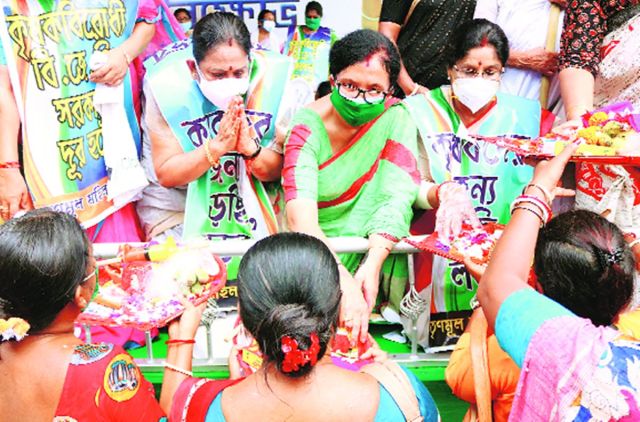 State minister Chandrima Bhattacharya and members of TMC women’s wing protest on Mayo Road, Kolkata, Tuesday. Express