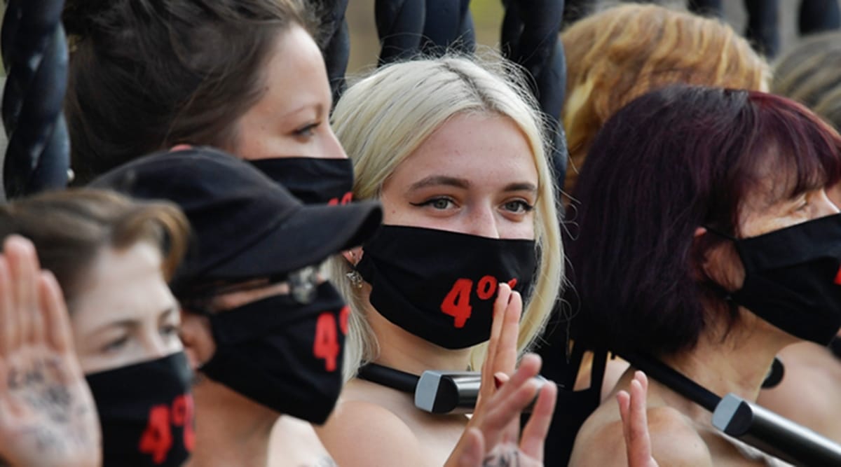 Climate activists are seen padlocked to the railings of the Houses of Parliament during an Extinction Rebellion protest in London, Britain, September 10, 2020. (Reuters)