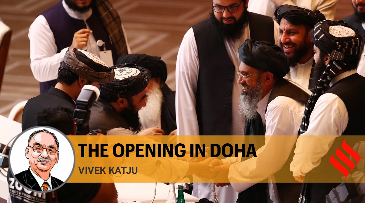 Taliban delegates shake hands during talks between the Afghan government and Taliban insurgents in Doha, Qatar September 12, 2020. REUTERS/Ibraheem al Omari