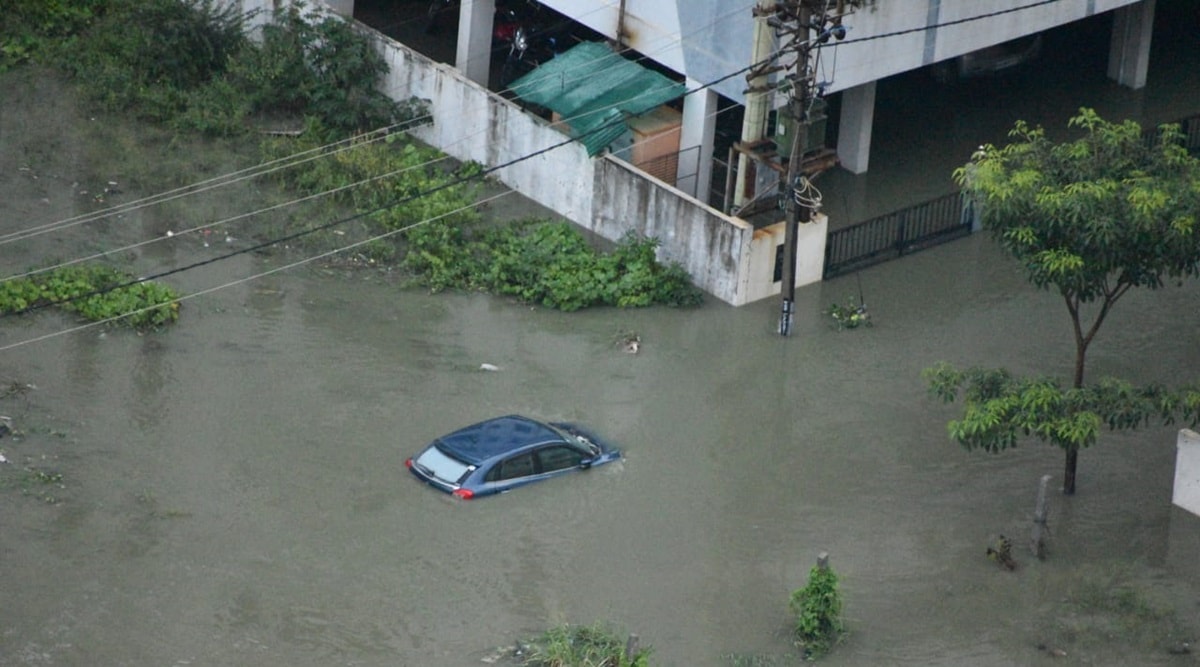 Bengaluru: Trees uprooted, vehicles submerged after heavy overnight rains |  Cities News,The Indian Express