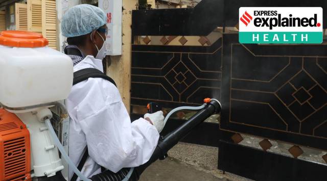 Municipal worker spray disinfectant at a house in Kankurgachi, Kolkata (Express photo by Partha Paul)