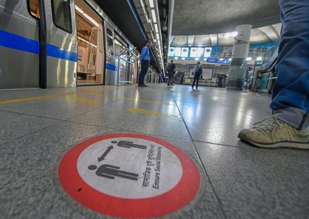 delhi metro, delhi metro reopening, covid protocol delhi metro, metro covid rules, social distancing delhi metro, aarogya setu delhi metro, delhi city news