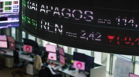 Screens display stock price information over the trading floor of the Euronext NV exchange in Paris, France, on Tuesday, Sept. 1, 2020. (Photographer: Nathan Laine/Bloomberg)