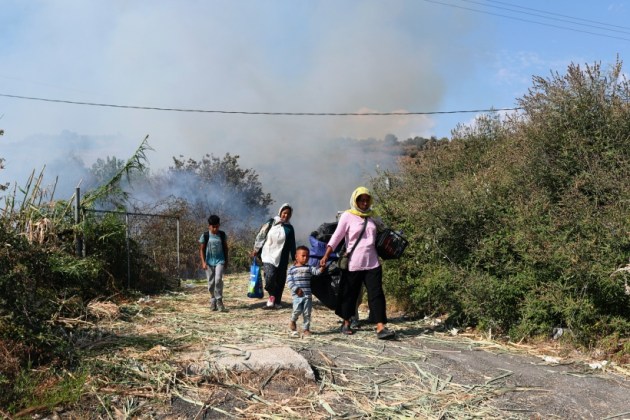Greece camp fire, Greece refugee camp fire, asylum seekers camp fire, lesbos camp fire, indian express