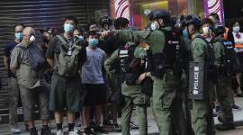 Hong Kong, Hong Kong Police, Hong Kong Police tackle girl, Hong Kong protests, Hong Kong anti-sedition law protests, anti-sedition law protests Hong Kong, world news, Indian Express