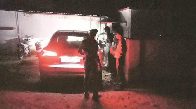 Forensic team inspecting Mahoba businessman Indra Kant Tripathi’s car on Monday. (Express photo by Vishal Srivastav)